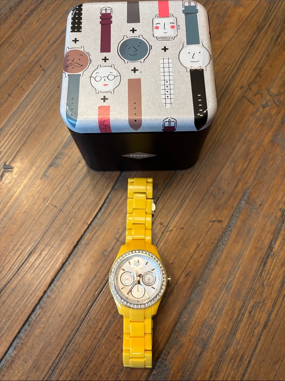 Fossil stainless steel and yellow watch with fossil storage tin